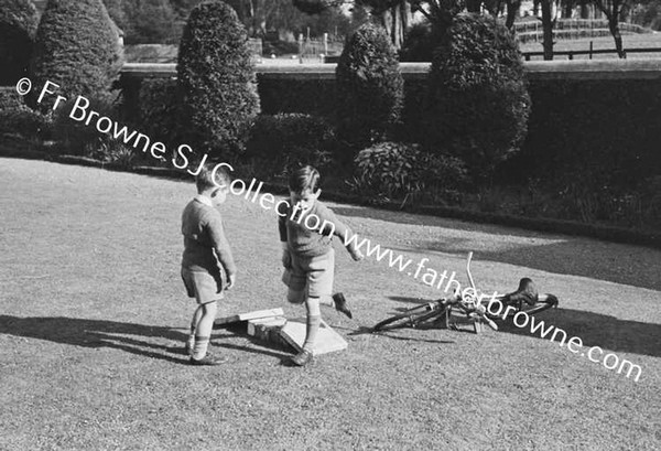 JOHN MALLICK PLAYING WITH HIS COUSINS O'NEILL & MRS O'NEILL AT MALLICKS ON CURRAGH